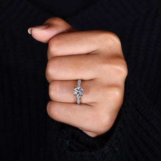 Round Diamond Engagement Ring set in a sleek white gold band.