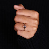 Solitaire Engagement Ring featuring a beautiful round cut diamond.