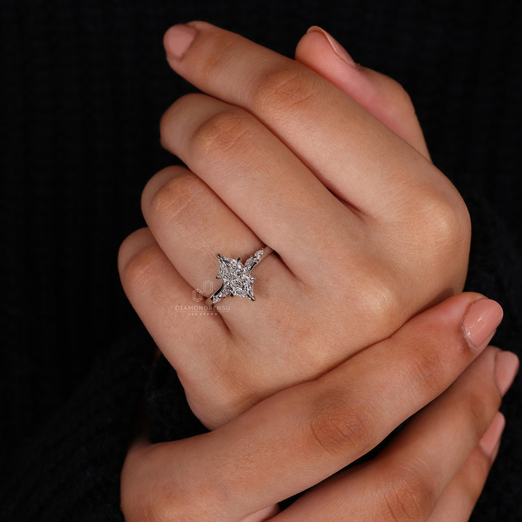 Claw Prongs on a beautiful Dutch Marquise Ring for security.