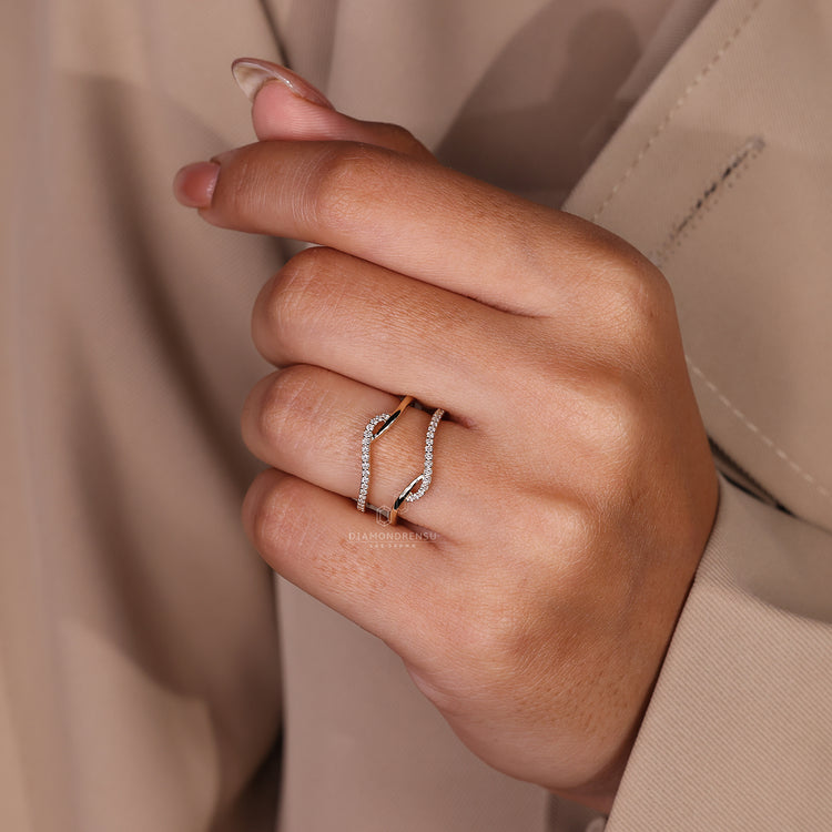 Wrap-style enhancer ring wedding band for added sparkle and sophistication.