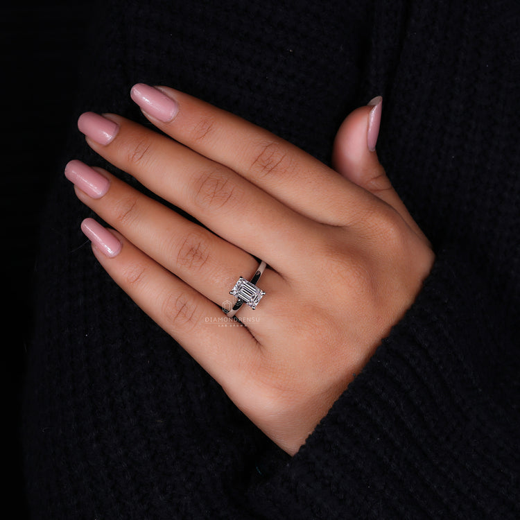 Prong Setting holding the emerald cut diamond securely in place.