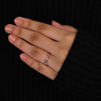 Rose gold handmade band featuring a leaf design.