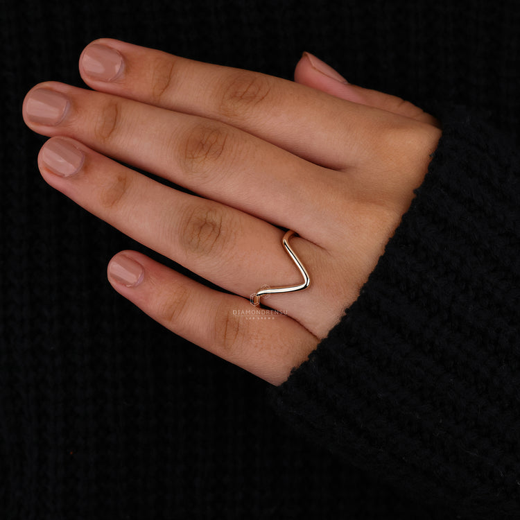 Simple yellow gold wedding band with clean lines