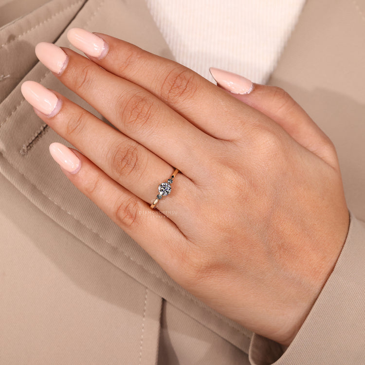 Diamondrensu engagement ring with moss agate side diamond.