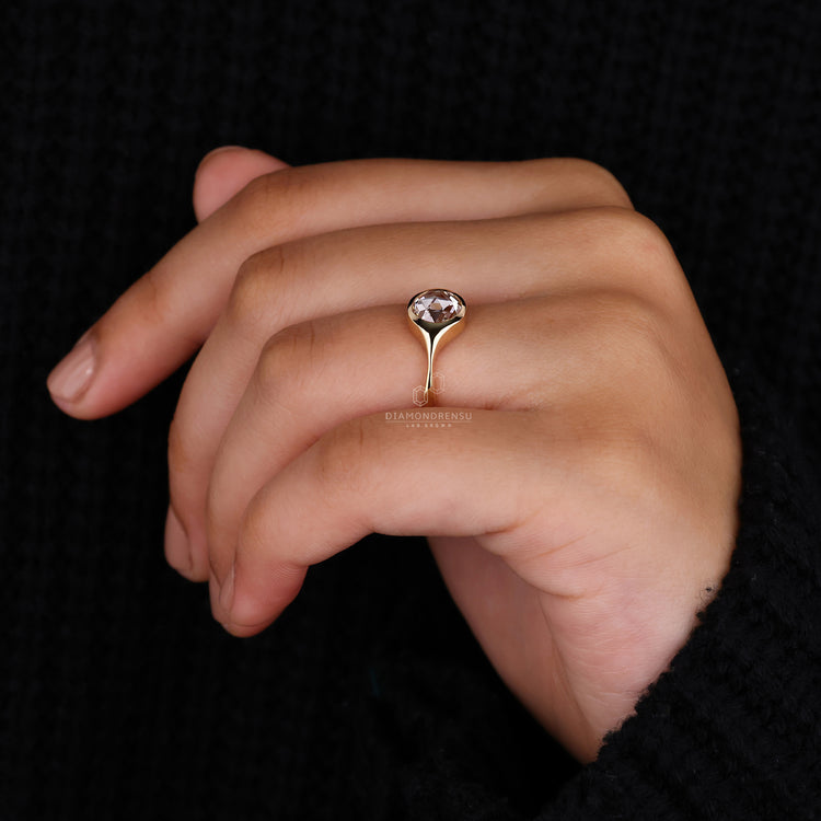 Yellow gold engagement ring with a beautifully set rose cut diamond.