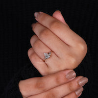 Three Stone Diamond Ring with pear-shaped diamonds.