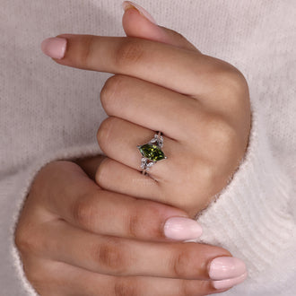 Nature inspired ring featuring a lab grown Dutch marquise diamond, sidestones, and white gold band