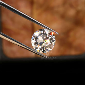 2.28 carat round Old European cut diamond fits perfectly in solitaire rings.