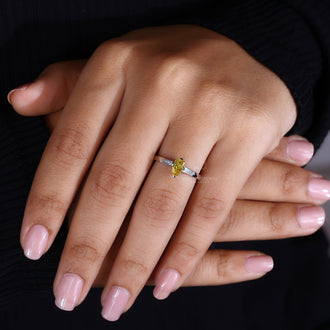 Round Cut Diamond Engagement Ring set in a sleek prong setting.