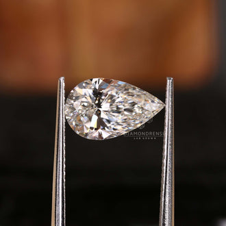 Pear cut lab diamond fits beautifully in handmade rings.