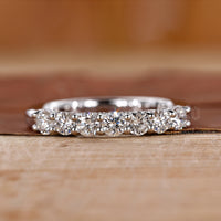 Half Eternity Wedding Band featuring elegant diamond design.