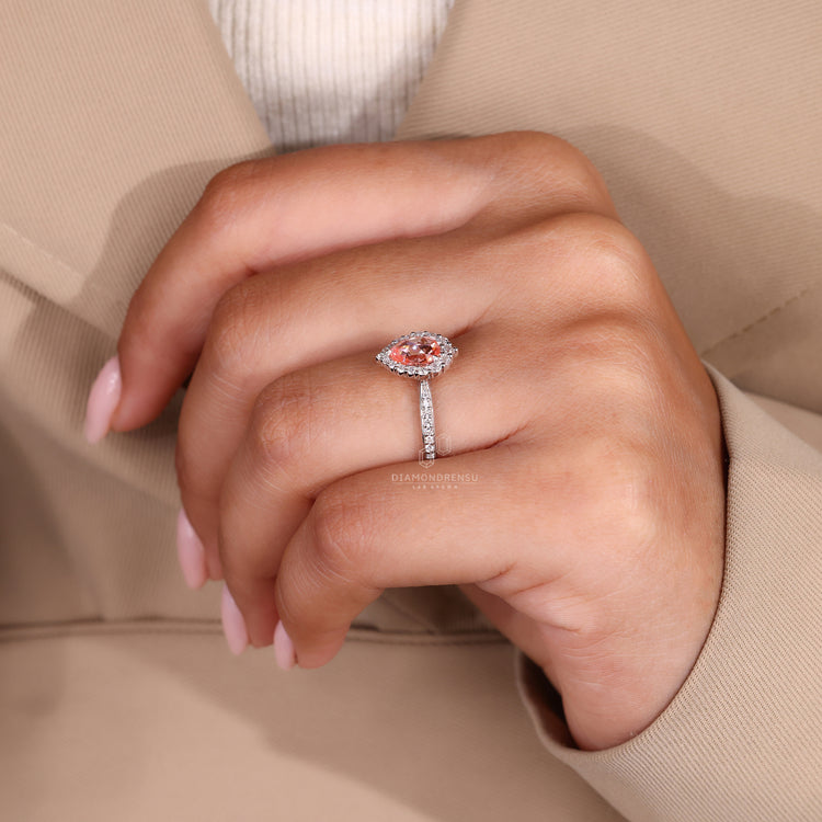 Handmade pear halo engagement ring by Diamondrensu.