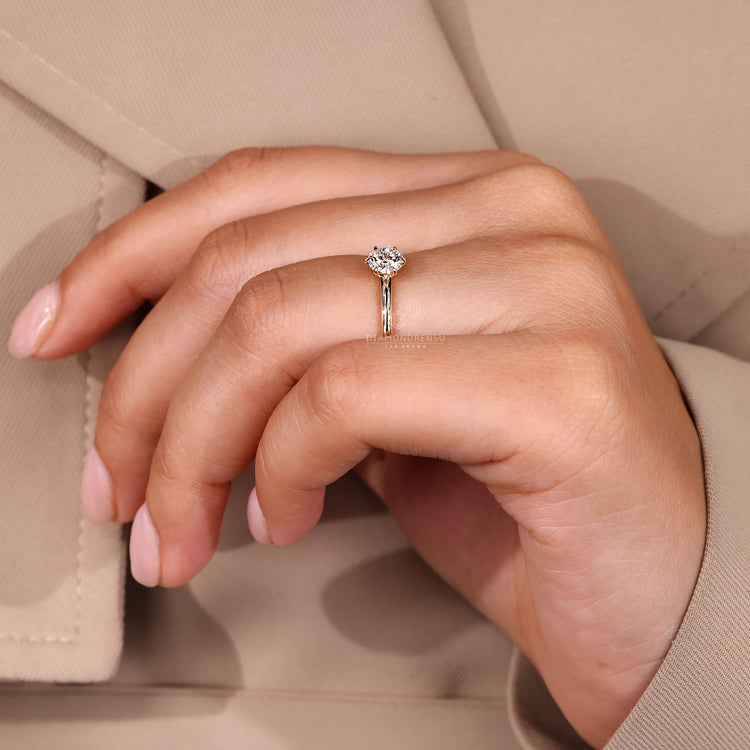 Elegant handmade jewelry with round brilliant cut diamond solitaire ring.