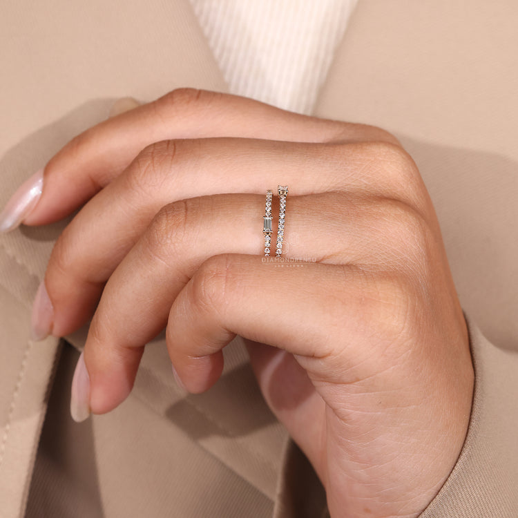 Prong set wedding band featuring brilliant cut diamonds.