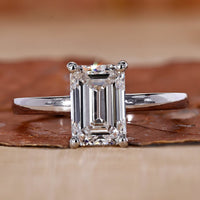 Hidden Halo Emerald Cut Engagement Ring with stunning sparkle.