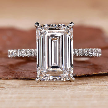 Emerald White Gold Ring with a stunning emerald cut diamond.