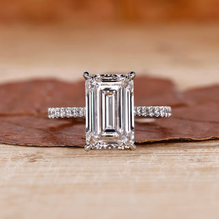 Emerald White Gold Ring with a stunning emerald cut diamond.
