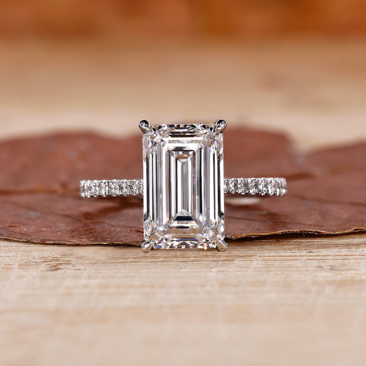 Emerald White Gold Ring with a stunning emerald cut diamond.