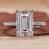 Emerald White Gold Ring with a stunning emerald cut diamond.