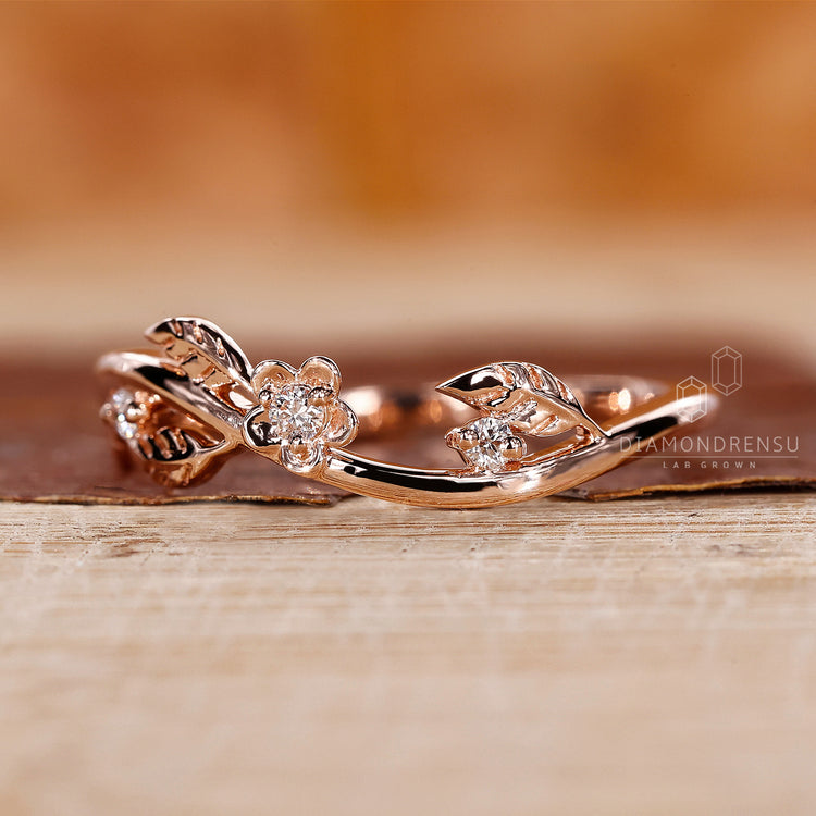 Diamondrensu rose gold leaf diamond wedding band.
