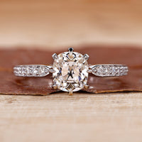 Cushion Cut Diamond Ring with stunning pave setting design.