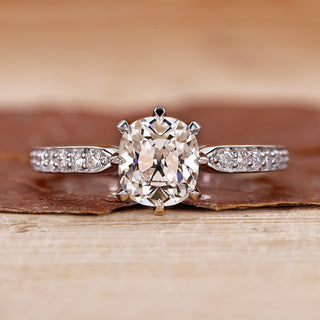 Cushion Cut Diamond Ring with stunning pave setting design.