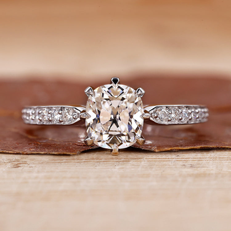 Cushion Cut Diamond Ring with stunning pave setting design.