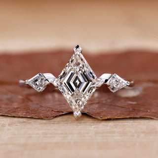 3 Stone Diamond Ring with brilliant diamonds in a prong setting.