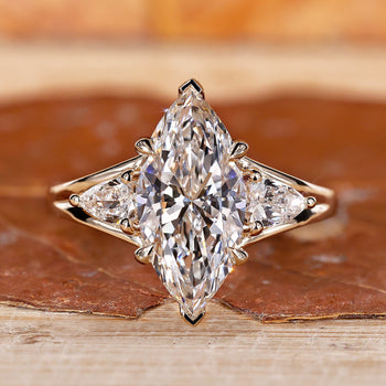 3 Stone Marquise Engagement Ring featuring brilliant diamonds.