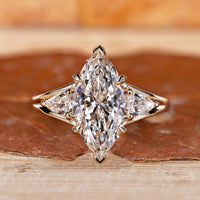 3 Stone Marquise Engagement Ring featuring brilliant diamonds.