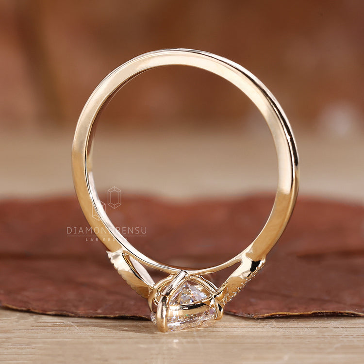 Yellow gold engagement ring with a classic, vintage touch.