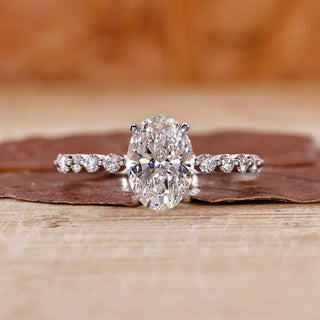 Oval Diamond Ring with brilliant sparkle in a classic setting.