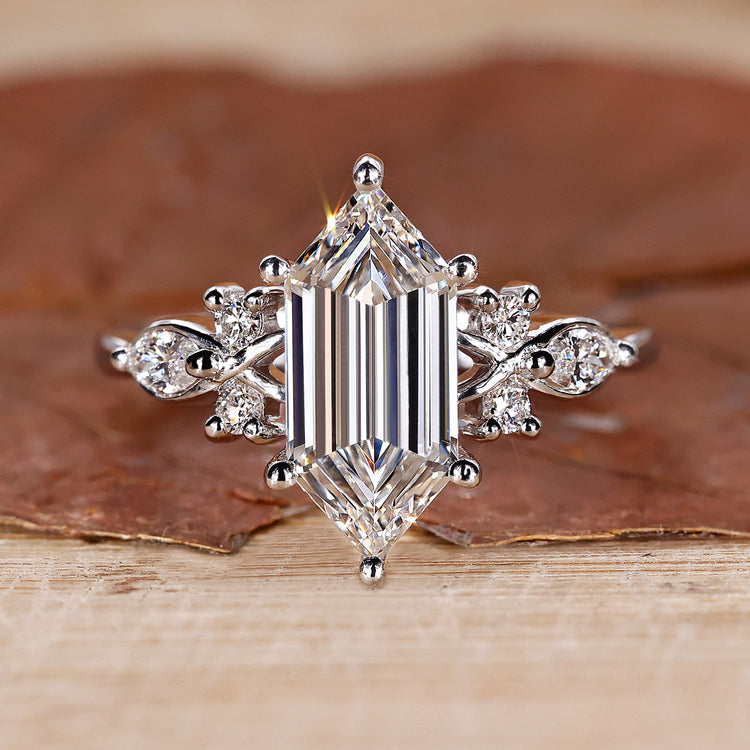 Elongated hexagon engagement ring in white gold.