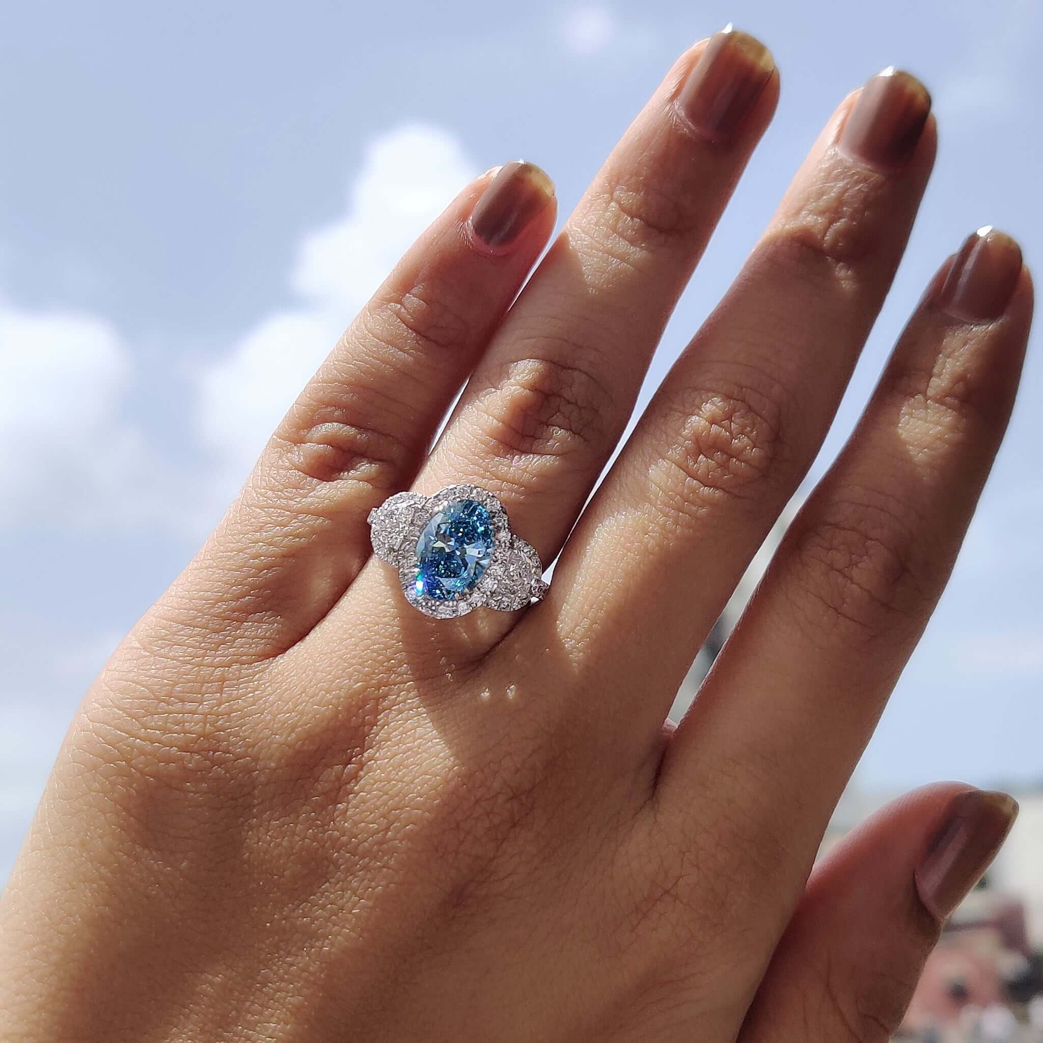 Elegant Blue Diamond Engagement Ring showcased in a pristine setting