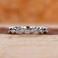 White gold wedding band with a clean, polished shine.