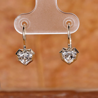 Heart diamond earrings with a brilliant sparkle.