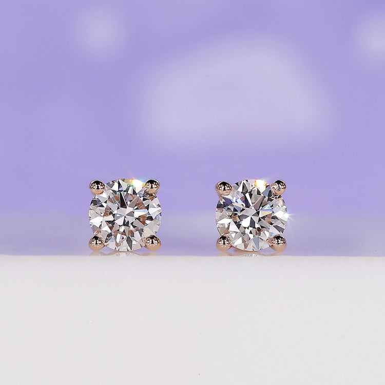 Rose Gold Diamond Stud Earrings with 0.70 TCW for timeless elegance.