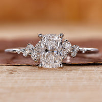 Elongated cushion cut diamond ring with a sparkling lab grown diamond in a prong setting.