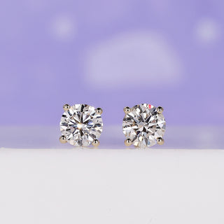 Stunning round diamond earrings crafted for timeless elegance.