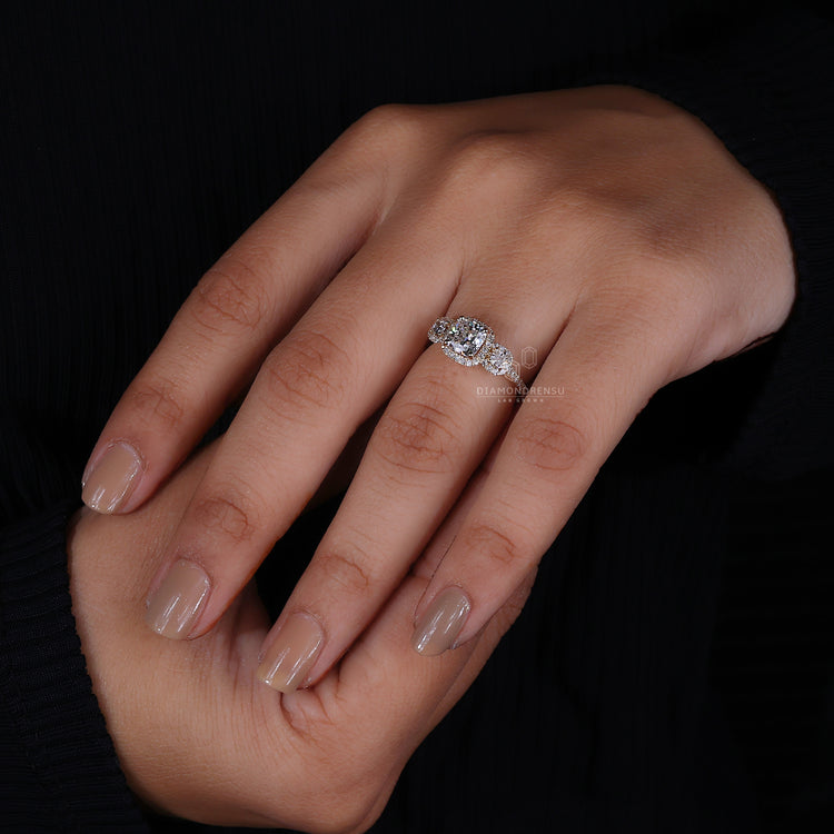 Prong Setting with a delicate 3 stone engagement ring design.