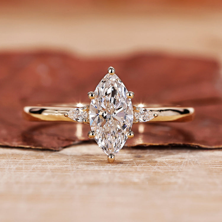 Three Stone Marquise Engagement Ring with a stunning prong setting.