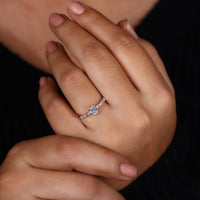 Oval shaped engagement ring featuring a unique and elegant design.