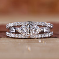 marquise of East West Marquise Engagement Ring with a delicate design.
