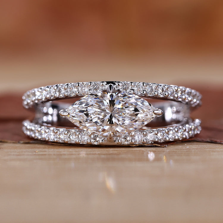 marquise of East West Marquise Engagement Ring with a delicate design.