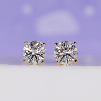 Stunning gold diamond earrings crafted for timeless elegance.