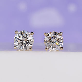 Classic round diamond stud earrings crafted for timeless style.