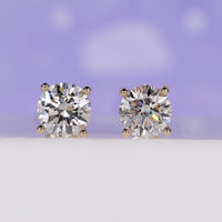 Classic round diamond stud earrings crafted for timeless style.