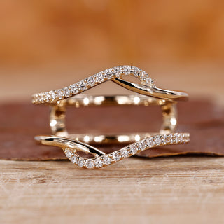 Wrap wedding band with intricate design for a stylish wedding look.