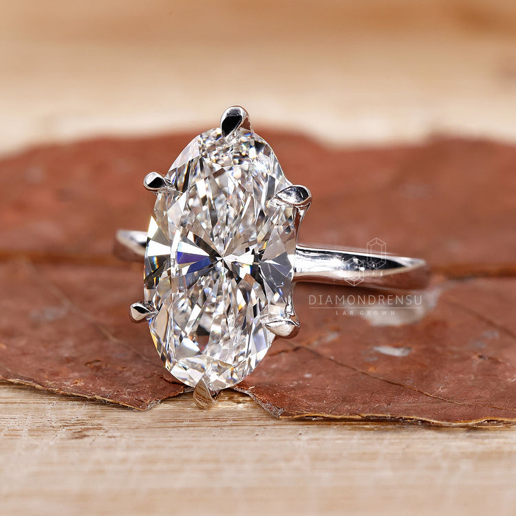 Solitaire Diamond Ring featuring a brilliant cut diamond.