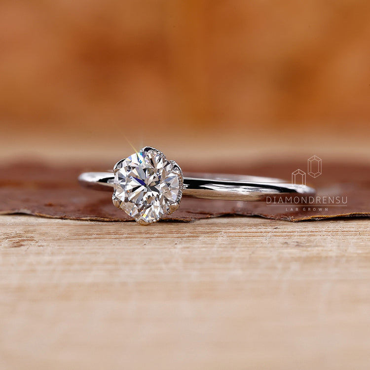 Round Diamond Engagement Ring in a minimalist style.
